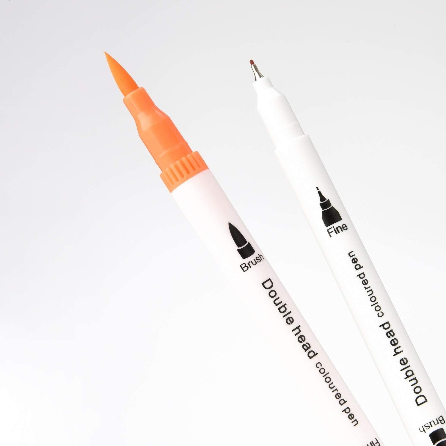 36 Colors Dual Tip Brush Markers Set for Art showing close-up of orange brush tip and fine tip detailing.