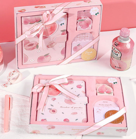 Peach Pink Magnetic Buckle Journal Gift Set with Kawaii Stationery, includes Journal, Pen, Washi Tape, and Accessories in Cute Peach-Themed Packaging.