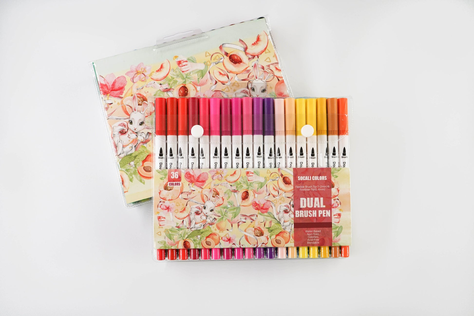 36 Colors Dual Tip Brush Markers Set for Art with watercolor floral and bunny-themed packaging, displaying an assortment of vibrant marker colors.