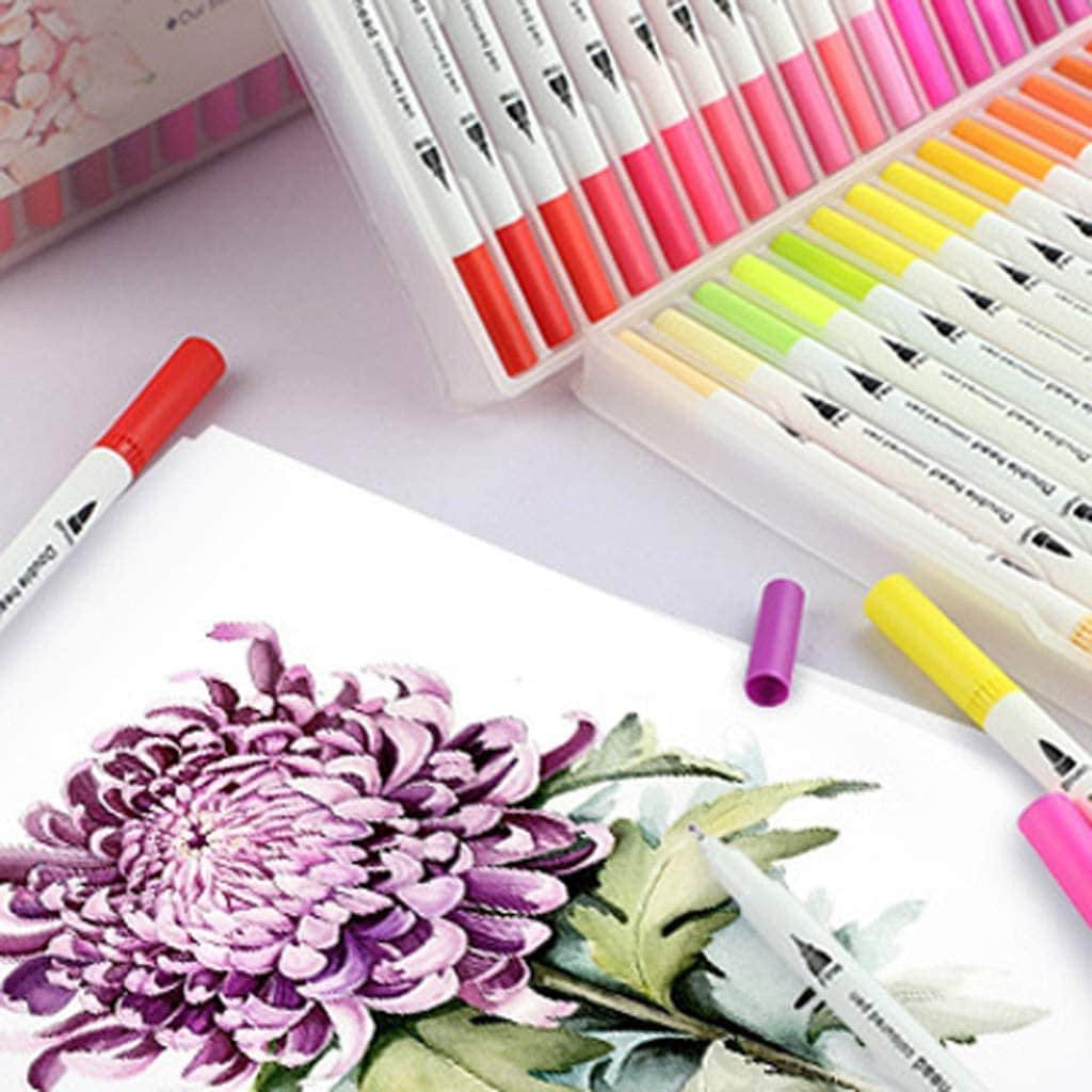 72 Colors Dual Tip Brush Marker Set used to create a colorful floral illustration, showcasing vibrant markers and their tips.