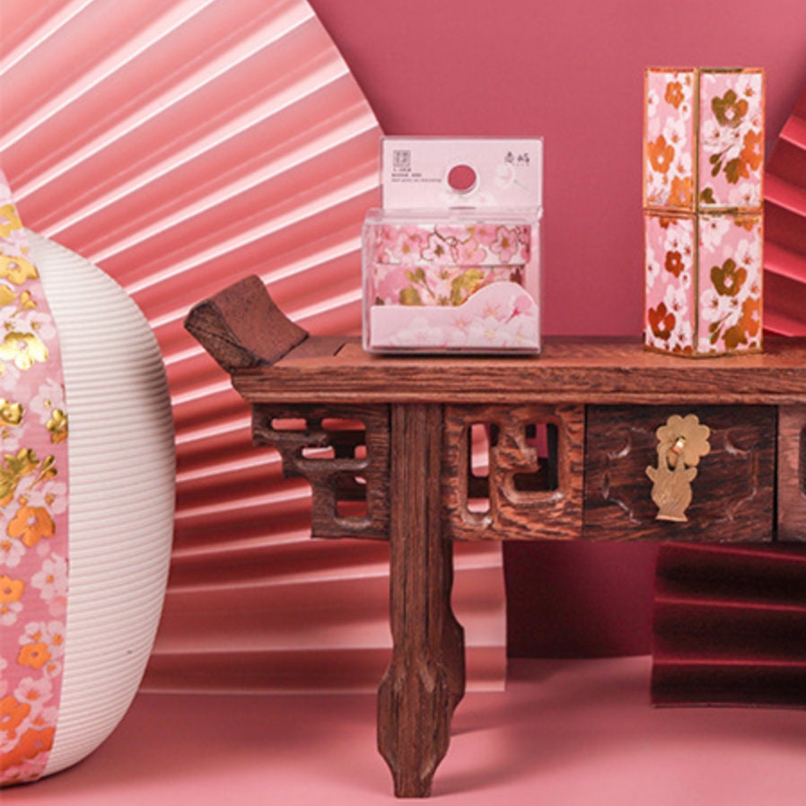 Pink Flowers Washi Tape Set displayed on an ornate wooden table with pink and gold floral designs, ideal for crafts and DIY gifts.