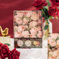 Sakura Mail Kit - Washi Tape, Stickers, Planner in a floral-themed package with pink and gold roses. Set against a background with red roses and a golden bird ornament. Perfect for kawaii stationery lovers and planners.