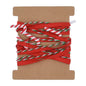 Red holiday ribbon with red, green, and white striped rope wrapped around a brown cardboard spool, 5.5 yards in length.