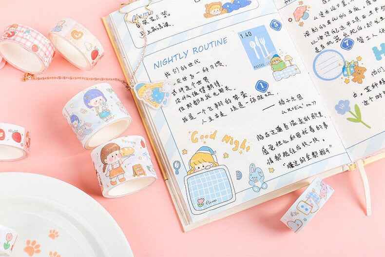 Blue Candy Washi Tape Set - 10 Rolls, Mixed Widths displayed around a decorated journal with cute illustrations.