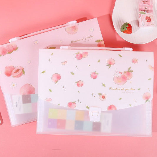 Pink Peach 13-Pocket A4 Document Organizer with cute peach illustrations and a secure latch, perfect for storing and organizing paperwork.