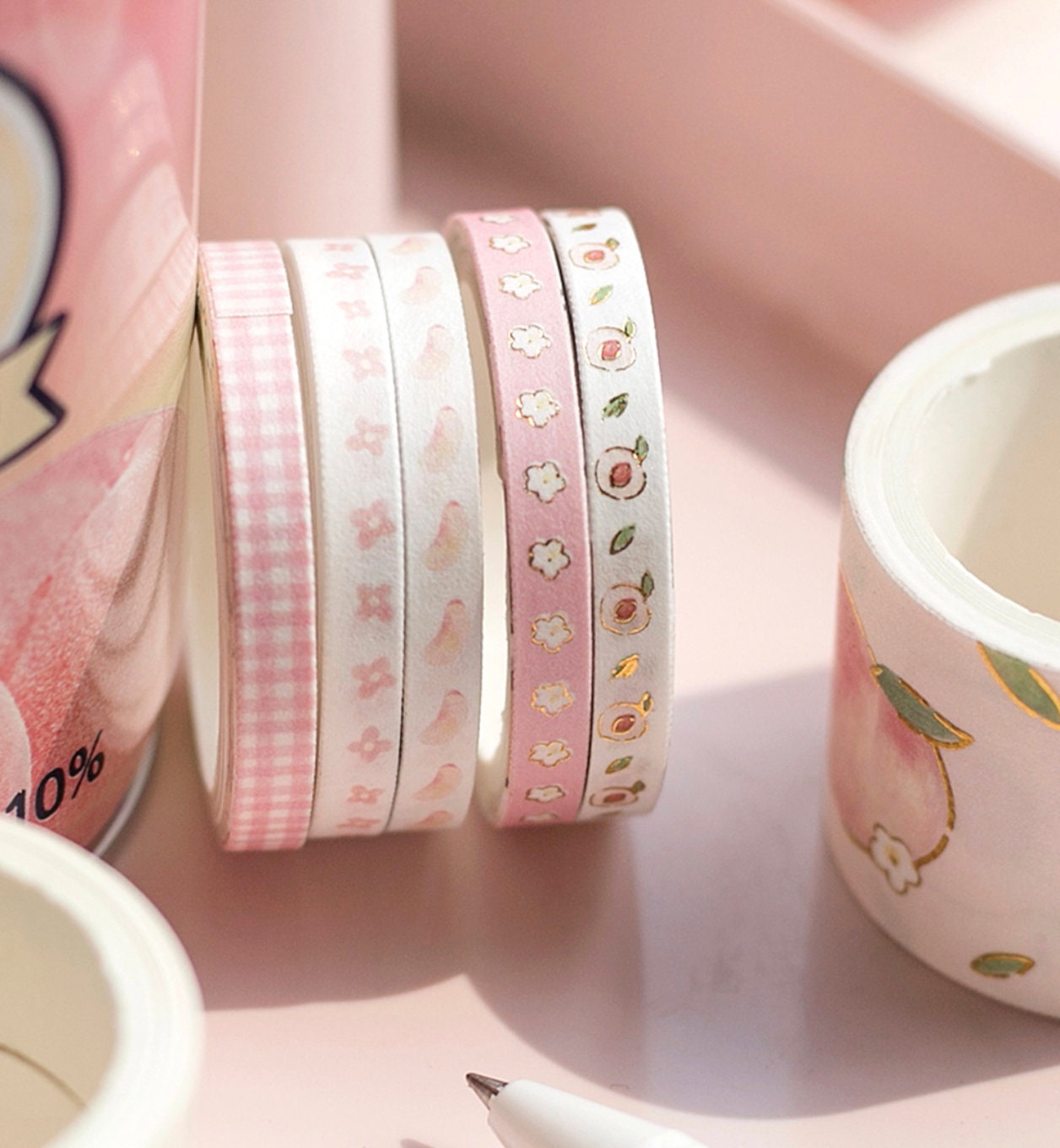 Peach Pink Washi Tape Set - 10 Rolls featuring cute and vibrant designs including pink gingham, floral patterns, and peach motifs. Perfect for scrapbooking, journaling, and DIY crafts.