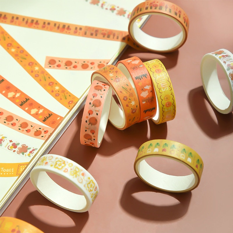 Cute colorful washi tape set with 5 rolls featuring adorable kawaii designs, perfect for scrapbooking, journaling, and DIY projects.