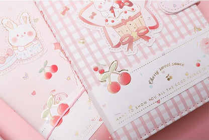 Sweet Cherry Leather Journal - Magnetic Buckle A5 Planner featuring kawaii bunny and cupcake illustrations, pink gingham patterns, and cherry motifs.