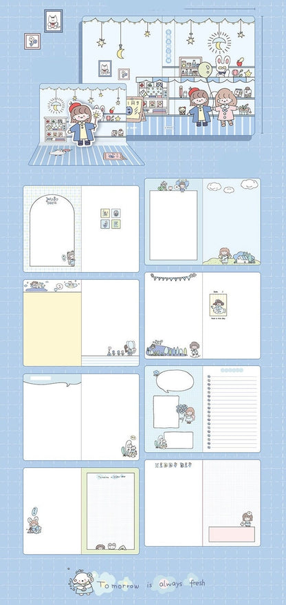 Dreaming World Hardcover Journal with Magnetic Buckle featuring kawaii characters and pastel illustrations, multiple adorable page designs, stationary collectors, cute notebook, journaling supplies.