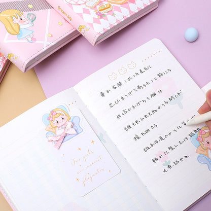 Pink leather journal with magnetic buckle and bookmark, kawaii design featuring cute illustrations, open to a page with handwritten text and a pastel-themed bookmark.