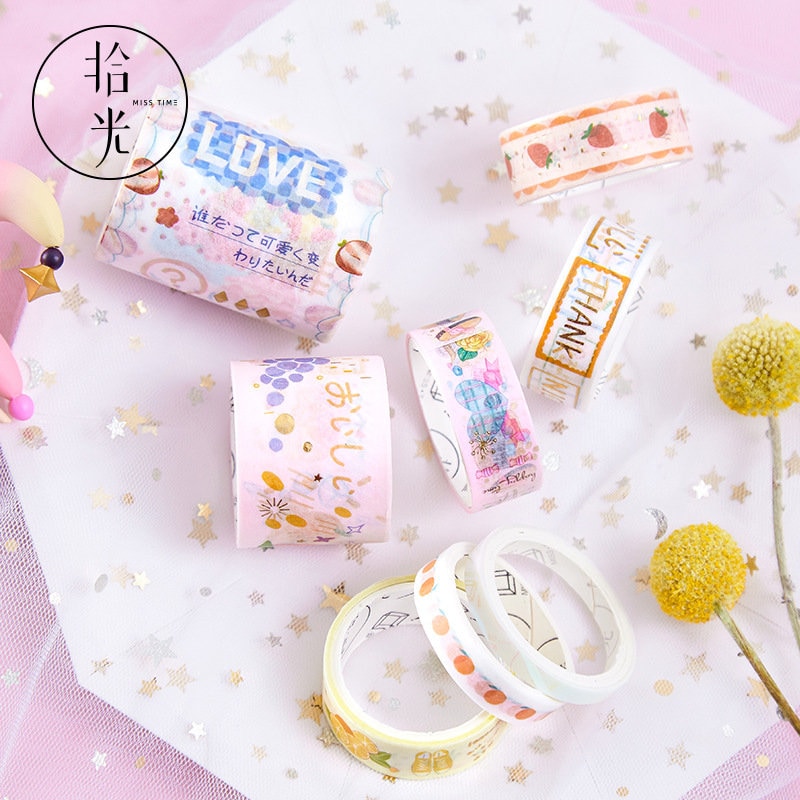 Mercury World Washi Tape Set - 8 Rolls in pastel colors with kawaii designs including "LOVE," strawberries, and floral patterns. Perfect for decorative purposes and DIY crafts.