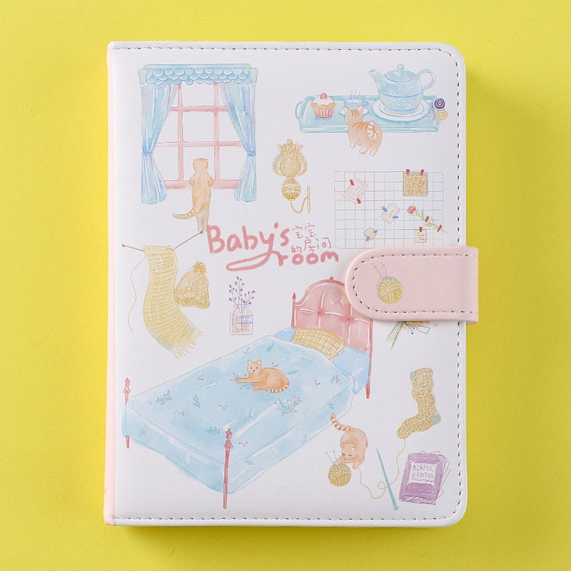 Purple blue leather journal with magnetic buckle featuring cute baby room illustrations, kawaii stationery planner