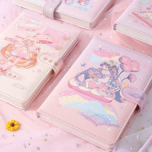 Fantasia in F Minor Journal with leather cover and bookmark, featuring kawaii-style art on a pink background, surrounded by cute illustrations and celestial decor.