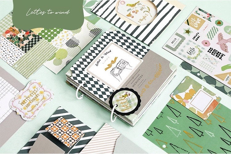 Aesthetic scrapbook paper in pastel and green tones with various patterns and designs, perfect for decorative journaling supplies and creative scrapbooking.