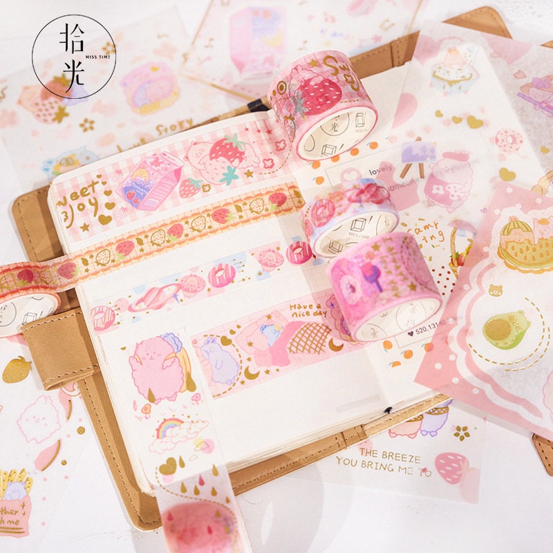 Red Fruit Washi Tape Set displayed on a bullet journal with cute, pink, and kawaii-style stickers featuring strawberries and playful designs.