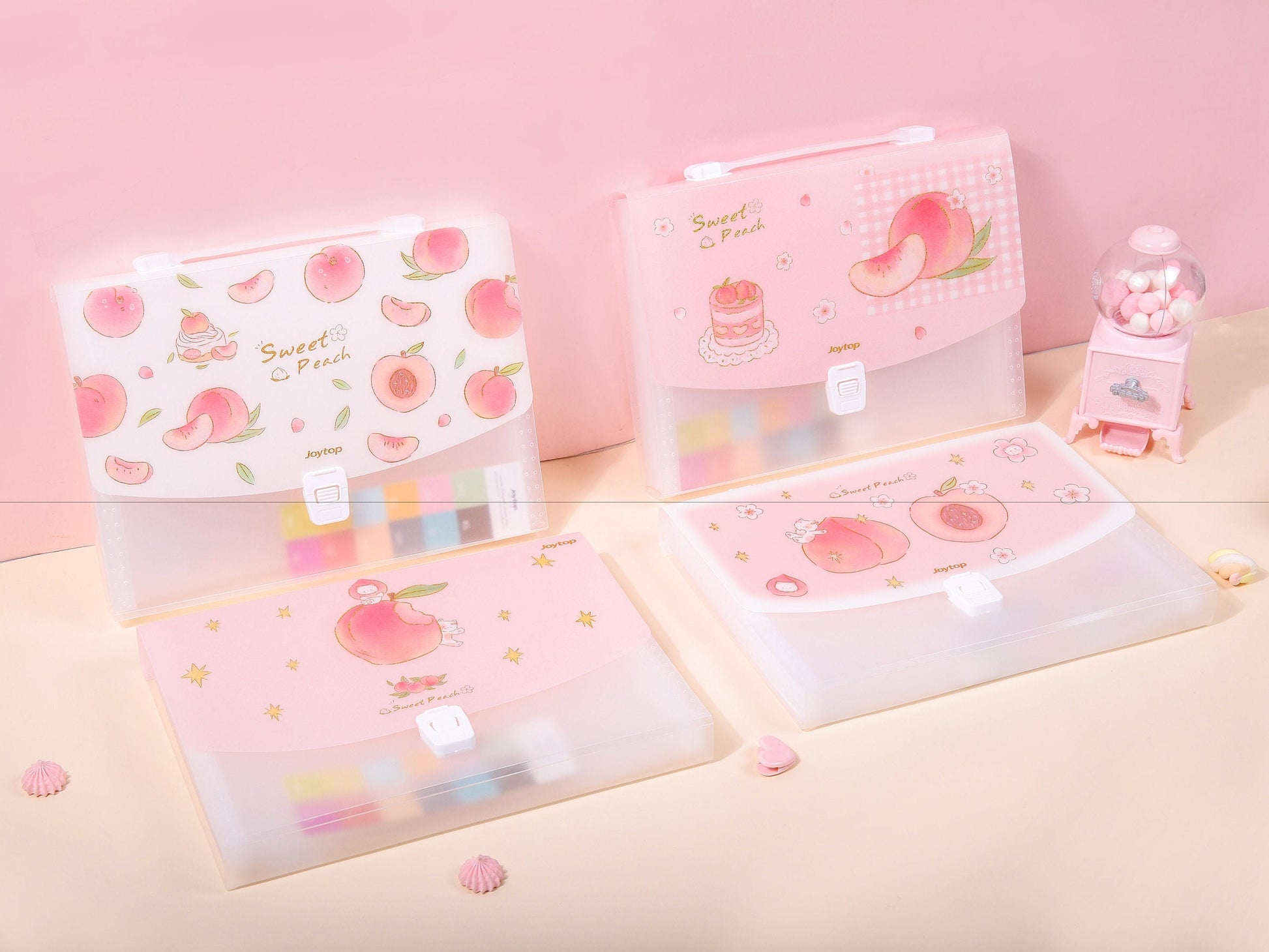 Pink Peach 13-Pocket A4 Document Organizer with cute peach-themed design, kawaii stationery for school or office, Sweet Peach branding, displayed in pastel-colored setting with candy dispenser.