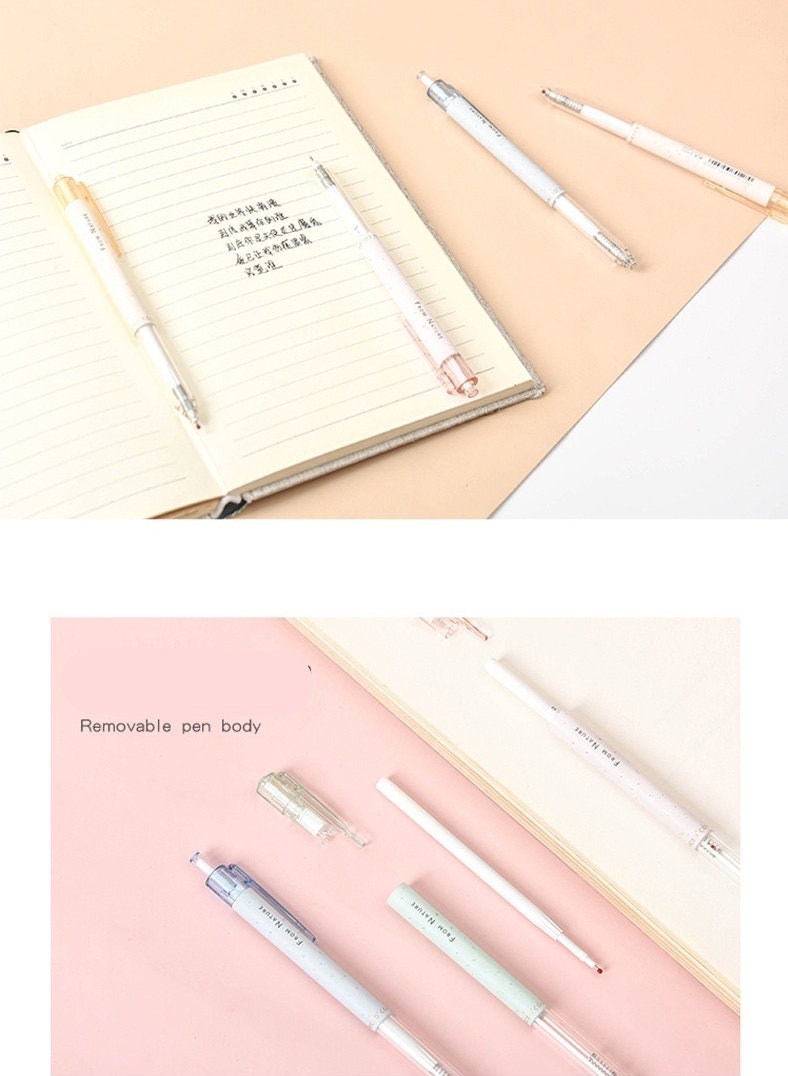 Minimalist 0.5mm black ink gel pens in pastel colors displayed on peach and white background with a notebook and disassembled pen parts, ideal for office and student use.