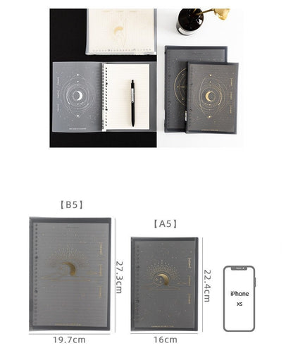 B5 Stars and Moons PVC Cover Planner in black with celestial design, shown open with lined paper and black pen, and closed with gold-embossed moon and stars pattern; available in B5 and A5 sizes with dimensions compared to iPhone XS.