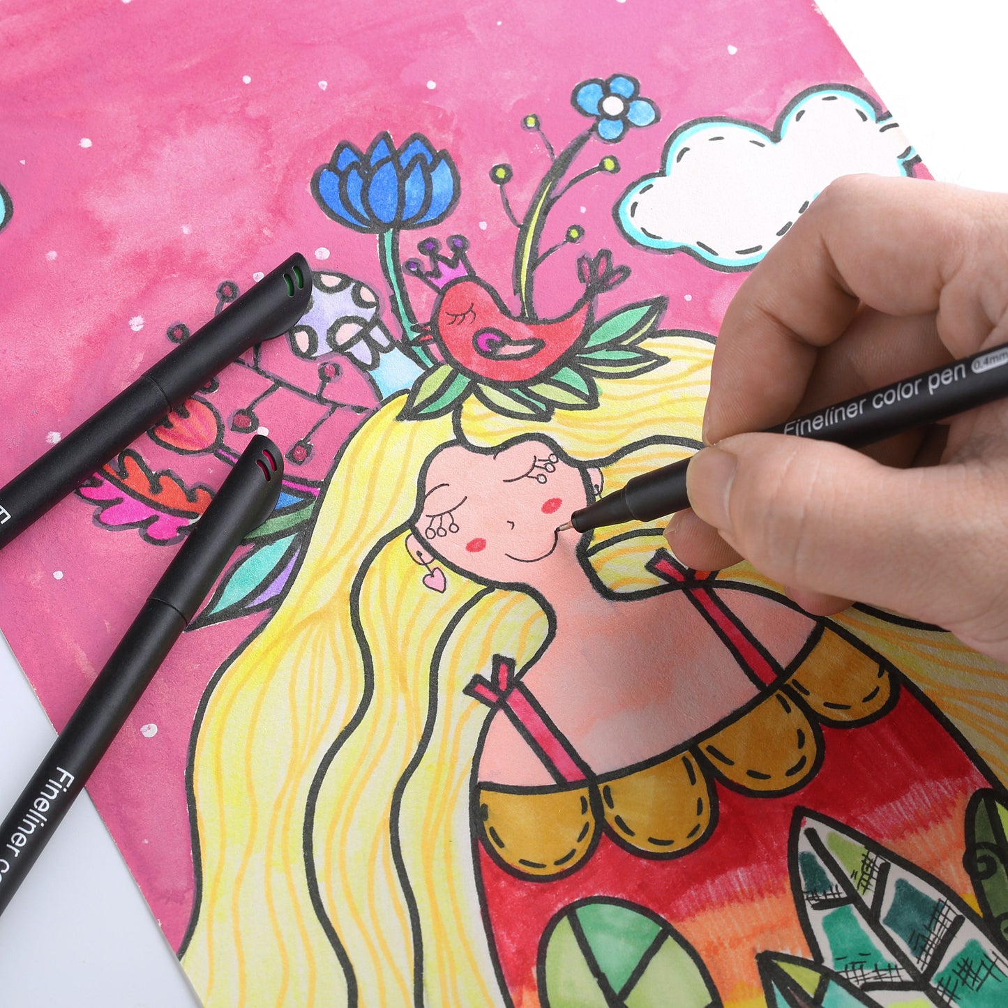 Hand drawing with black fineliner pen from 48 color fineliner pens set on a colorful art piece with a girl, flowers, and bird, perfect for journals and art projects.