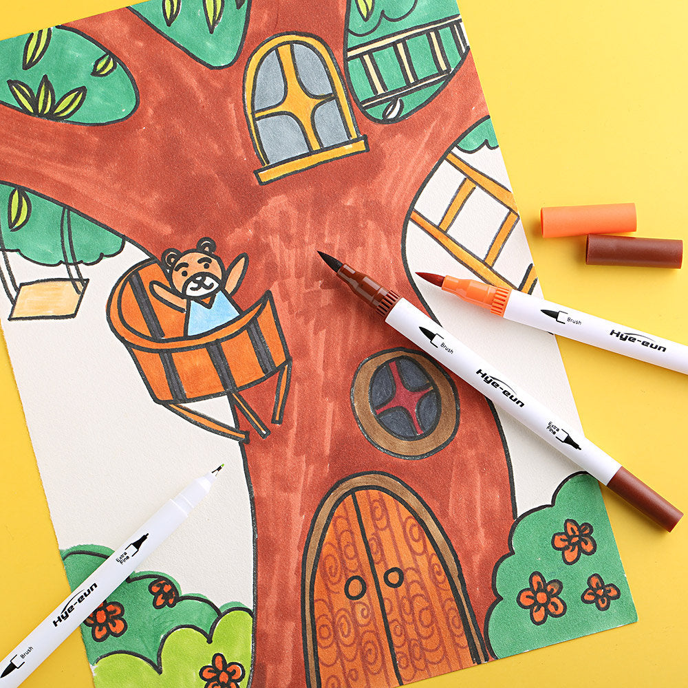 72 Colors Dual Tip Brush Marker Set with artwork of a cute bear living in a tree house, showcasing bright and vibrant colors with dual-tip brush markers on yellow background.