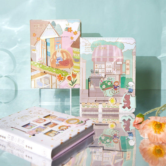 Pink Leather Garden Theater Journal - Magnetic Buckle A5 featuring kawaii illustrations of garden scenes with animals, flowers, and buildings.