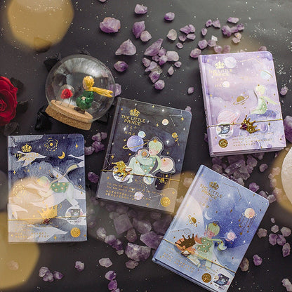 The Little Prince A5 3D Notebook with Bookmark featuring enchanting illustrations and purple gemstone decorations