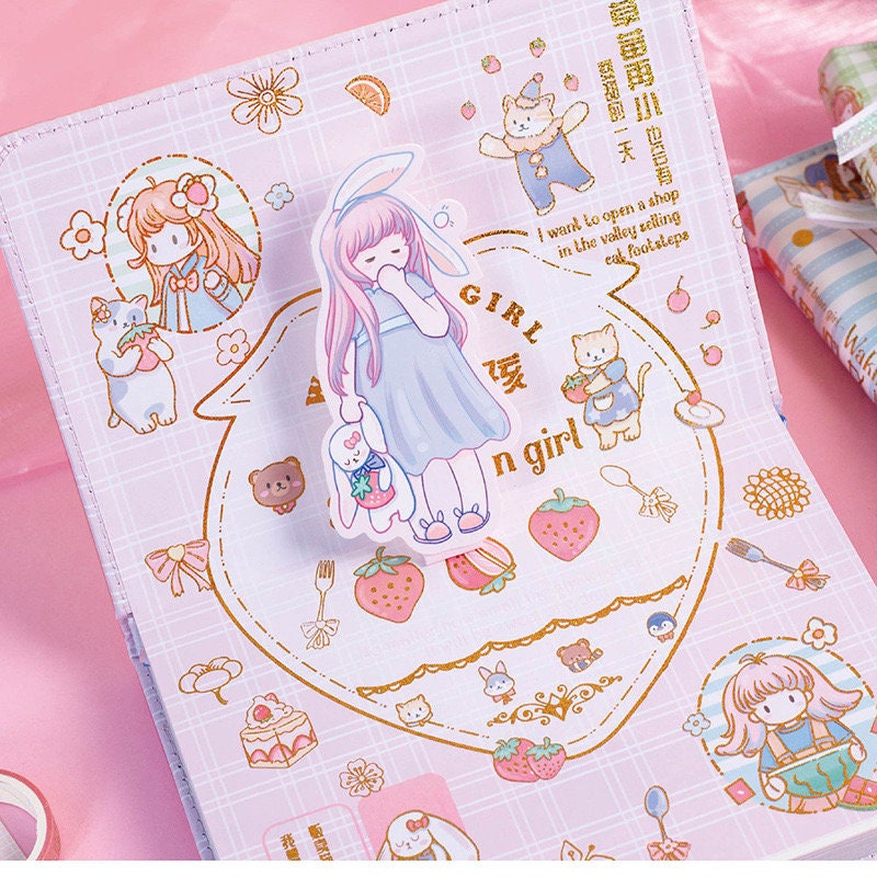 Magnetic Buckle Leather Journal - Sweet Bean Girl with adorable kawaii illustrations, featuring a cute girl with bunny ears, strawberries, and animal friends, perfect for stationery lovers.