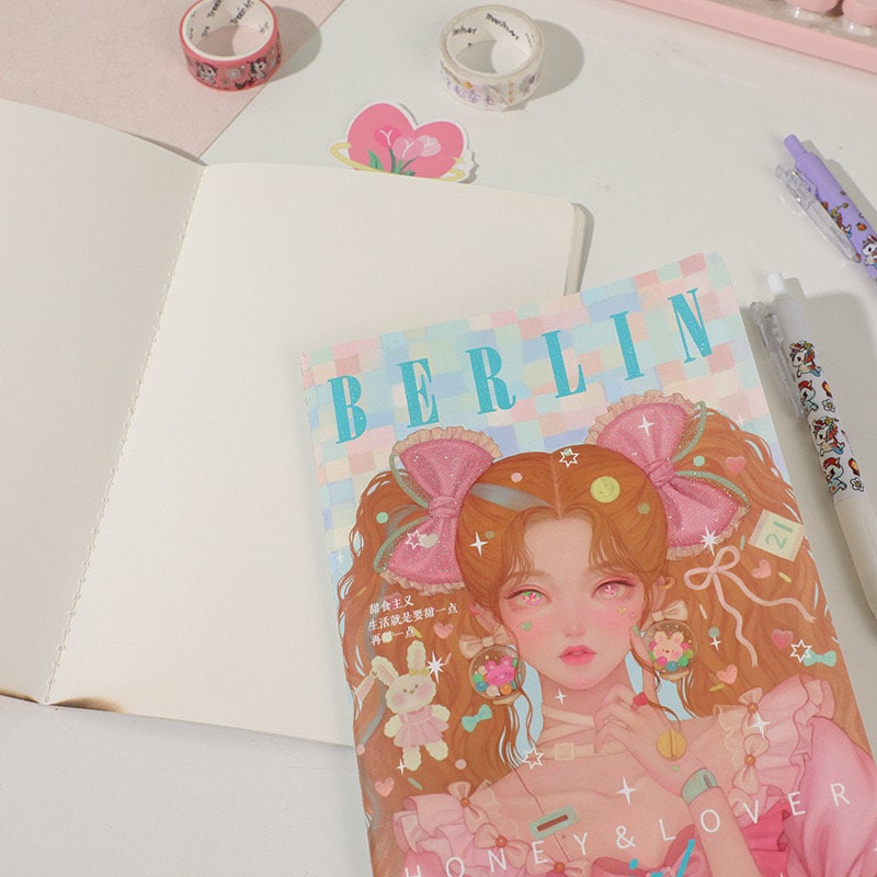 Fashion Girl Magazine-Style B5 Notebook with 80 Lined Pages featuring cute kawaii artwork, surrounded by washi tapes, stickers, and kawaii-themed pens.