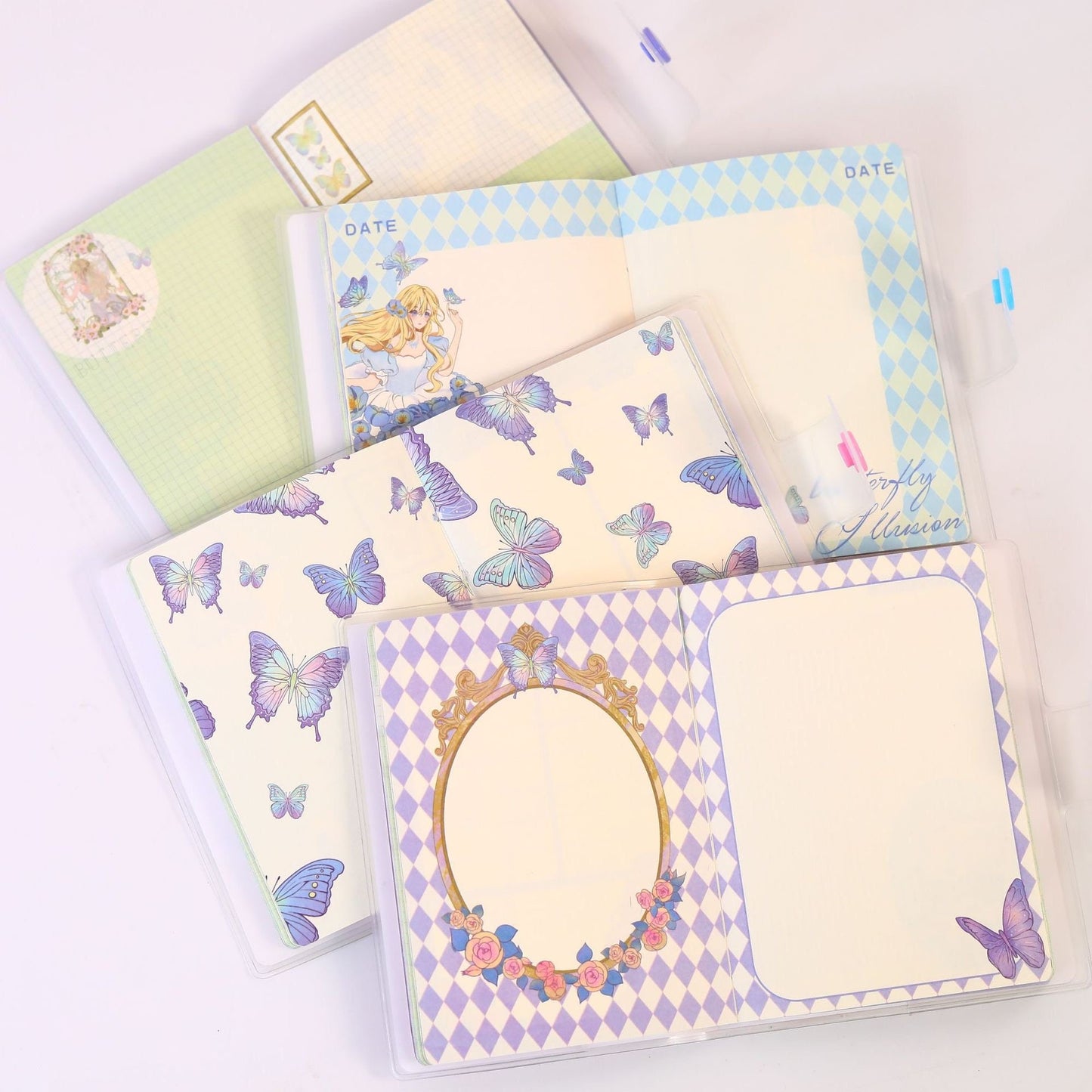 A6 Butterfly Pocket Journal with PVC cover and 192 pages, featuring light blue and lavender butterfly designs and patterned pages.