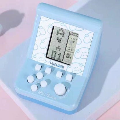 Mini game player kids puzzle gaming device in light blue color with control buttons and LCD screen displaying a pixelated game.