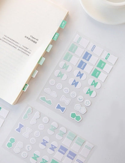 Reusable Colorful Sticky Label Set - 162 Pieces featuring cute, pastel-colored tabs and shapes for organization and decoration.