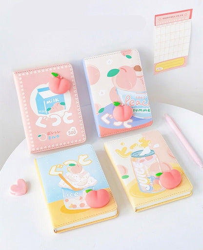 Silicone Peach Soft Leather Planner with 224 Pages in kawaii style. Adorable designs featuring peach-themed illustrations, perfect for organizing and note-taking. Includes cute 3D peach embellishments and comes in pastel colors.