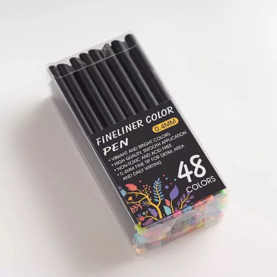 48 Color Fineliner Pens Set in clear packaging. Each pen is 0.4mm, perfect for journals, art projects, and detailed writing. The set includes vibrant and bright colors, with high-quality, smooth application, and acid-free ink.