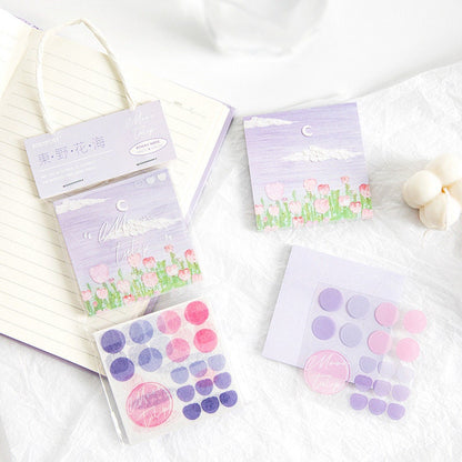 Flower Field Sticky Notes Set - 120 Pieces, featuring a pastel purple design with tulip flowers, moon, and clouds; includes circular sticky tabs in gradient shades of pink, purple, and blue.