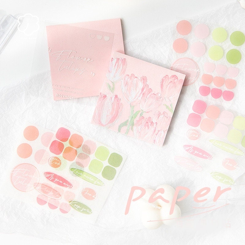 Flower Field Sticky Notes Set - 120 Pieces in pink and green hues, featuring floral designs and various shapes of sticky notes arranged on a white crinkled background.