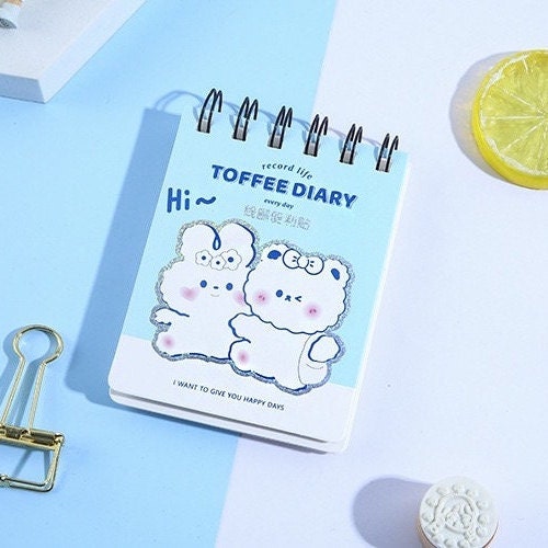 Toffee Diary Decorative Sticky Notepad Memo Pad with cute animal characters on the cover, kawaii stationery for note-taking and organizing.