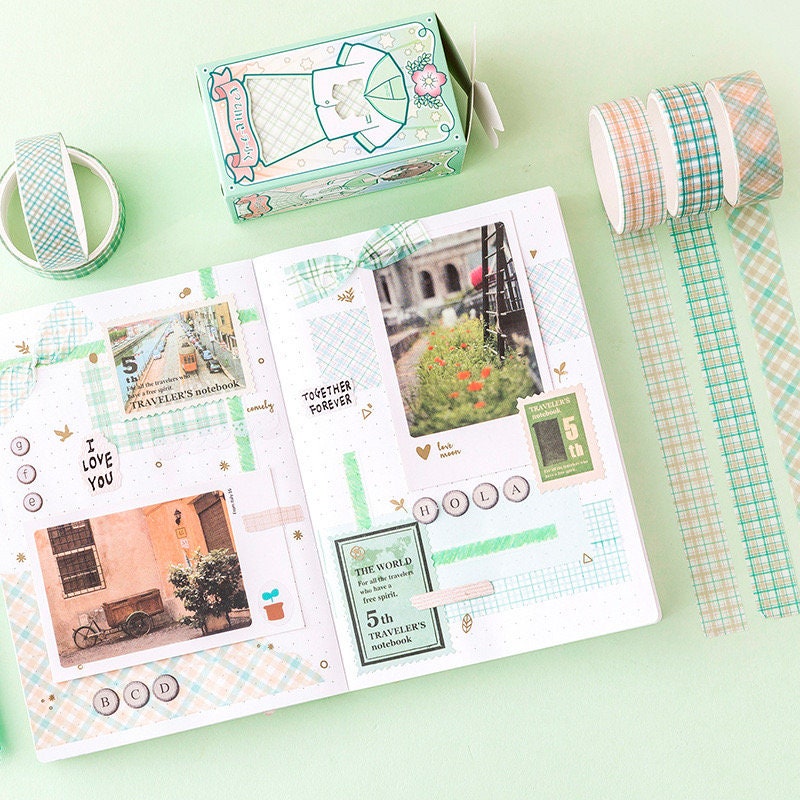 Colorful Grid Washi Tape Set for Planners and DIY projects featuring plaid designs, displayed in a decorated journal with cute scrapbook elements and pastel backgrounds.