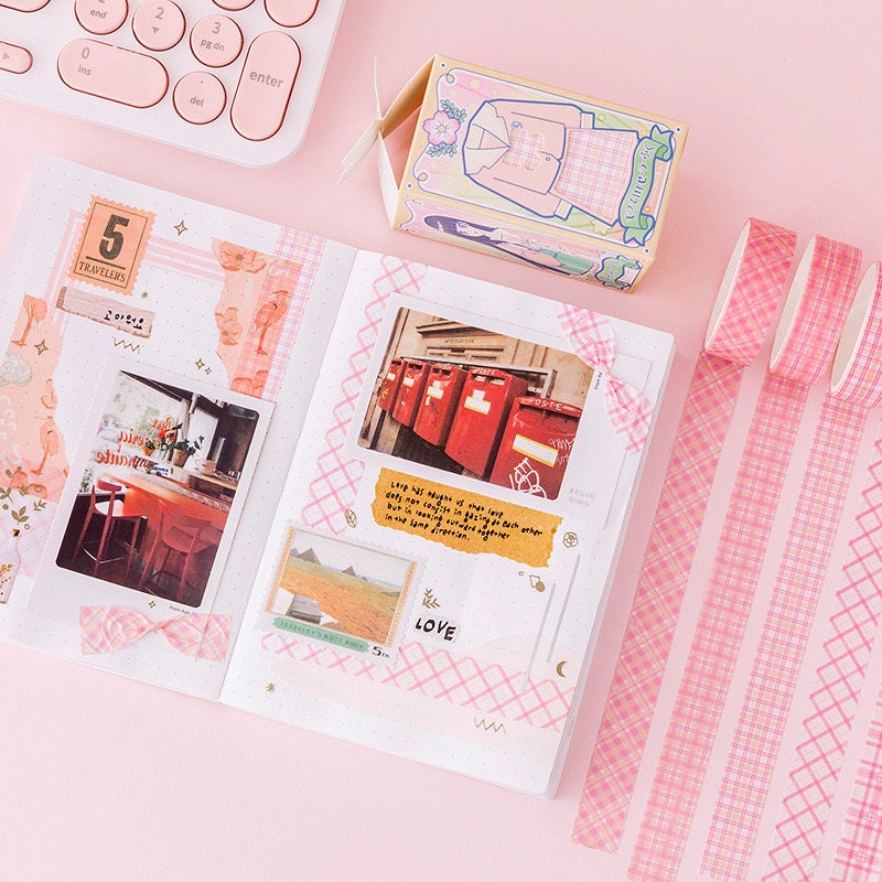 Colorful Grid Washi Tape Set displayed with a planner and DIY craft journal, showcasing pink grid patterns, perfect for decorating planners, journals, and scrapbooking projects.