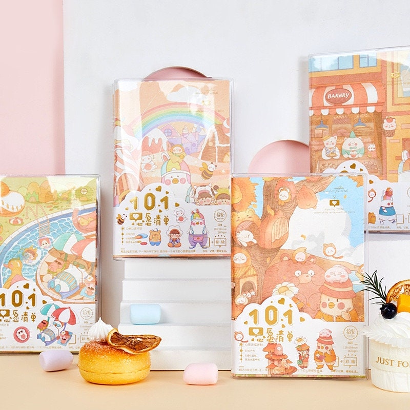 Crystal Cover Rainbow Town Journal - 192 Pages A5 with kawaii-style illustrations of a whimsical town, pastel colors, and adorable characters, perfect for note-taking and scrapbooking.