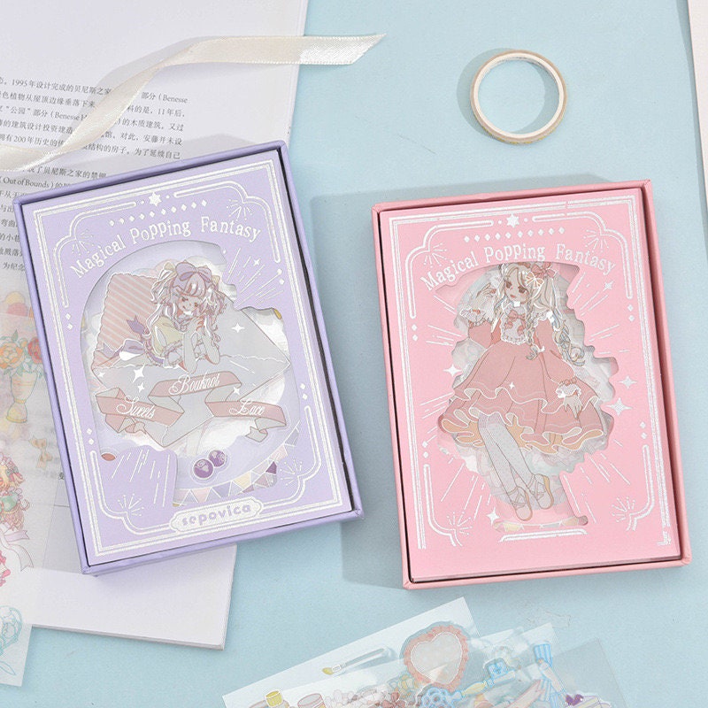 Magical Silver Foil Stickers for Planners and Crafts in pastel-colored boxes with kawaii anime character designs - perfect for scrapbooking, journaling, and DIY projects.