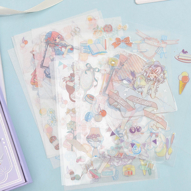 Magical silver foil stickers for planners and crafts featuring kawaii illustrations of whimsical girls, desserts, bows, and decorative elements, perfect for journaling, scrapbooking, and DIY projects.