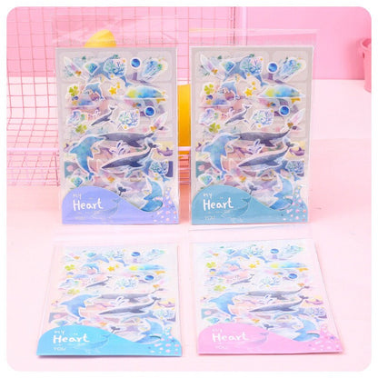 Kawaii Dolphin Ocean Stickers Set - 20 Designs featuring adorable dolphin illustrations, colorful marine life elements, and ocean-themed decorations perfect for DIY crafts, scrapbooking, and planners.