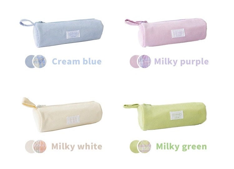 Double-Sided Milky Cream Fabric Pencil Case in four colors: cream blue, milky purple, milky white, and milky green, featuring kawaii design and zip closure.