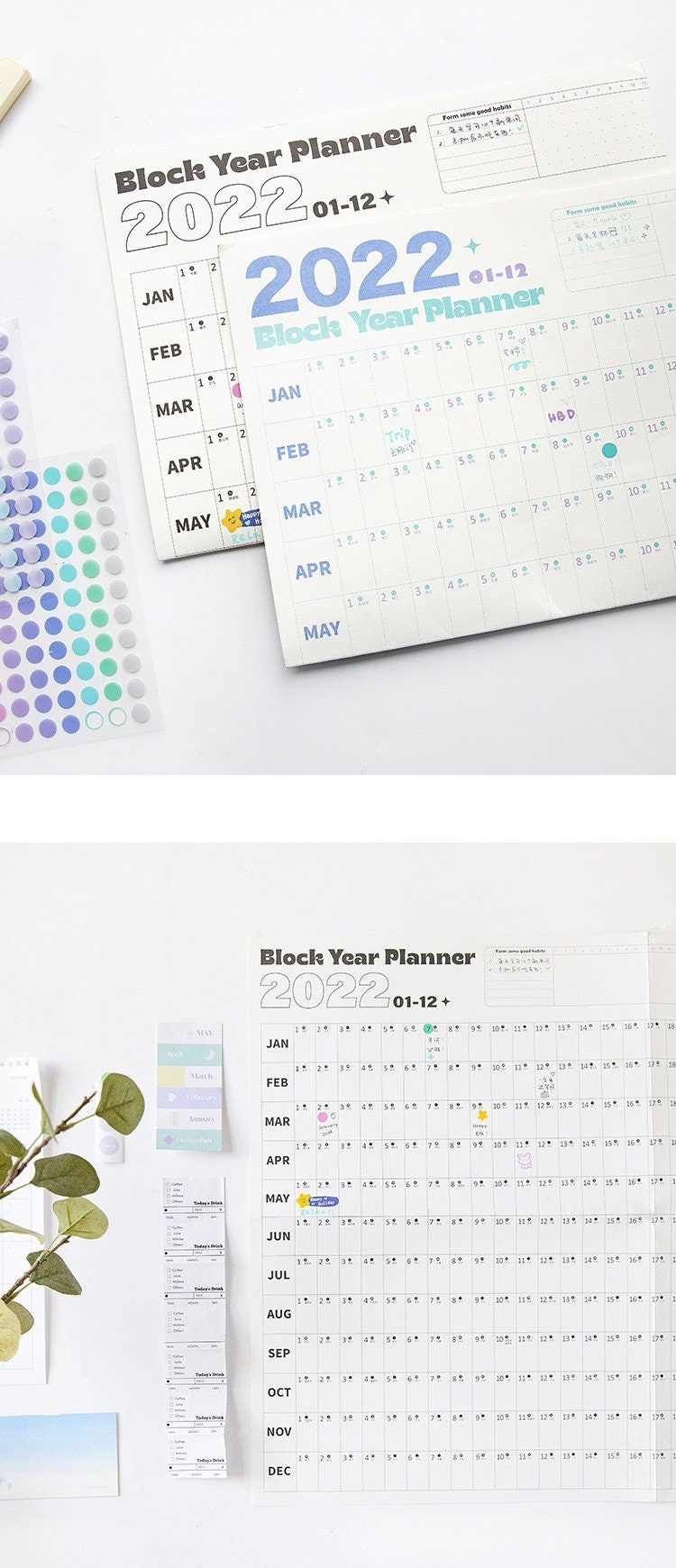 2022 Yearly Planner with goal tracker and organizer, displaying months January to December, colorful stickers, and habit tracker section. Perfect for planning, scheduling, and organizing your year.