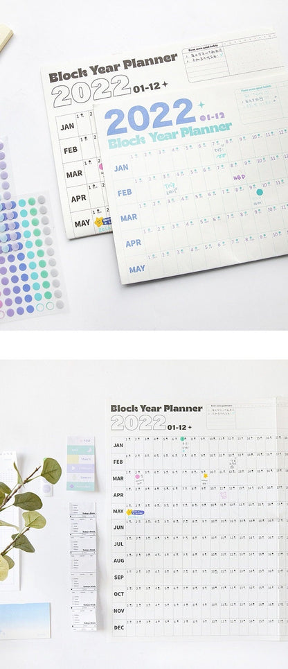 2022 Yearly Planner with goal tracker and organizer, displaying months January to December, colorful stickers, and habit tracker section. Perfect for planning, scheduling, and organizing your year.