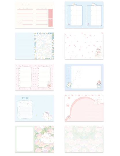 Flower Prelude Pink Leather Planner - open pages with floral and pastel designs, featuring weekly and monthly layouts, to-do lists, and note sections, kawaii stationery.