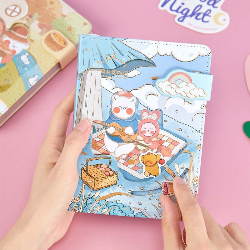 Jungle Adventure Pink Leather Journal with Magnetic Buckle featuring kawaii animal characters on a picnic in a whimsical forest setting.