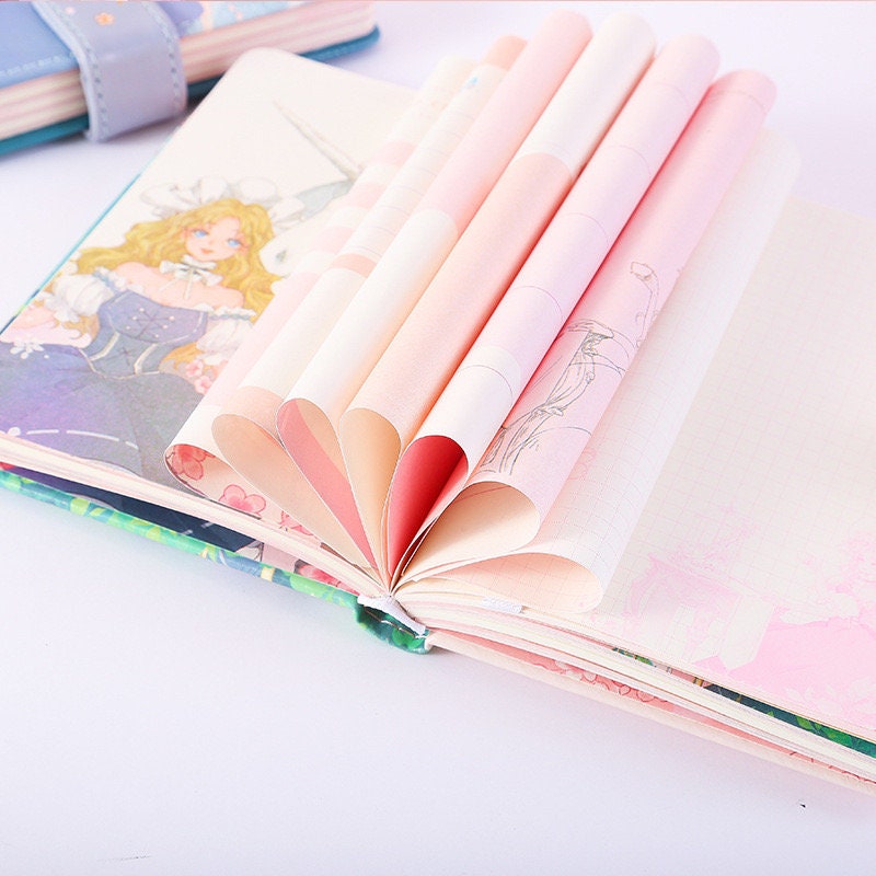 Princess Unicorn Magnetic Buckle Leather Notebook A6 with kawaii illustrations and pink pages featuring a heart shape formed by rolled pages.