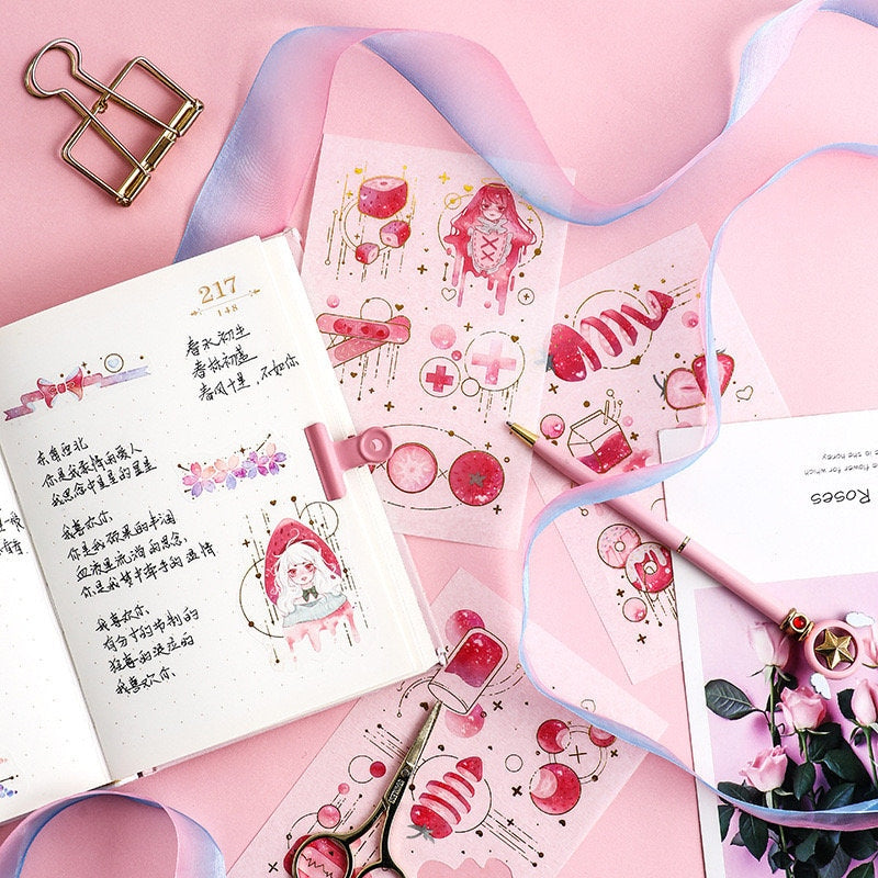 Dream Star Silver Foil Washi Sticker Set displayed alongside a decorated notebook, pink pen, gold scissors, and pastel ribbon on a pink background