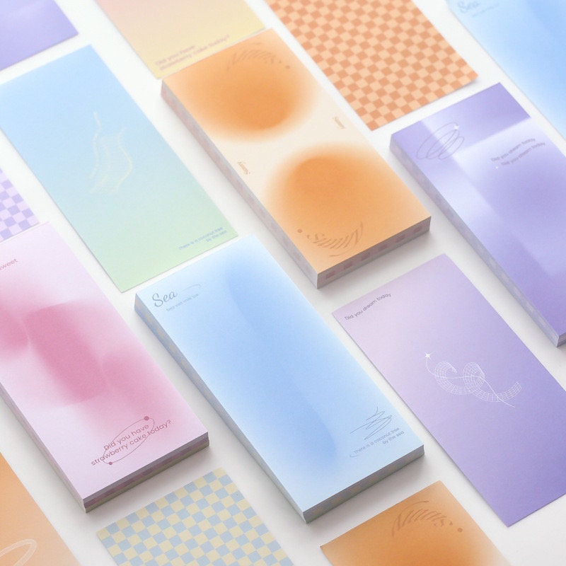 Dreamy Island Notepad Set with 90 sticky notes featuring pastel colors and whimsical designs including gradients, checks, and soft patterns, perfect for kawaii stationery lovers.